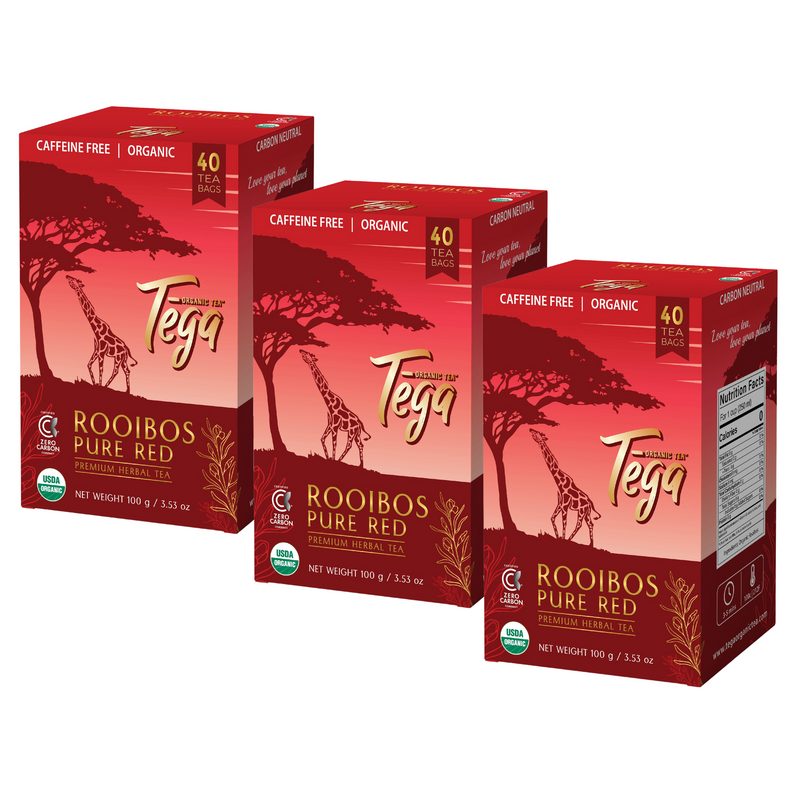 Three boxes of Tega Rooibos Pure Red tea on a white background